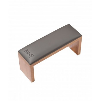 Armrest for manicure on brown legs Gray